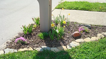Build a stone border around your flower gardens and landscape.